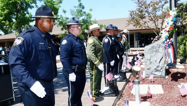 Lemoore, Kings law enforcement gather for annual Peace Officers Memorial Kings County's finest at attention for Peace Officers Memorial.